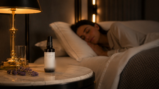 Elgiva Lavender Oil spray bottle on bedside table for spraying pillow and sleeping woman in bed