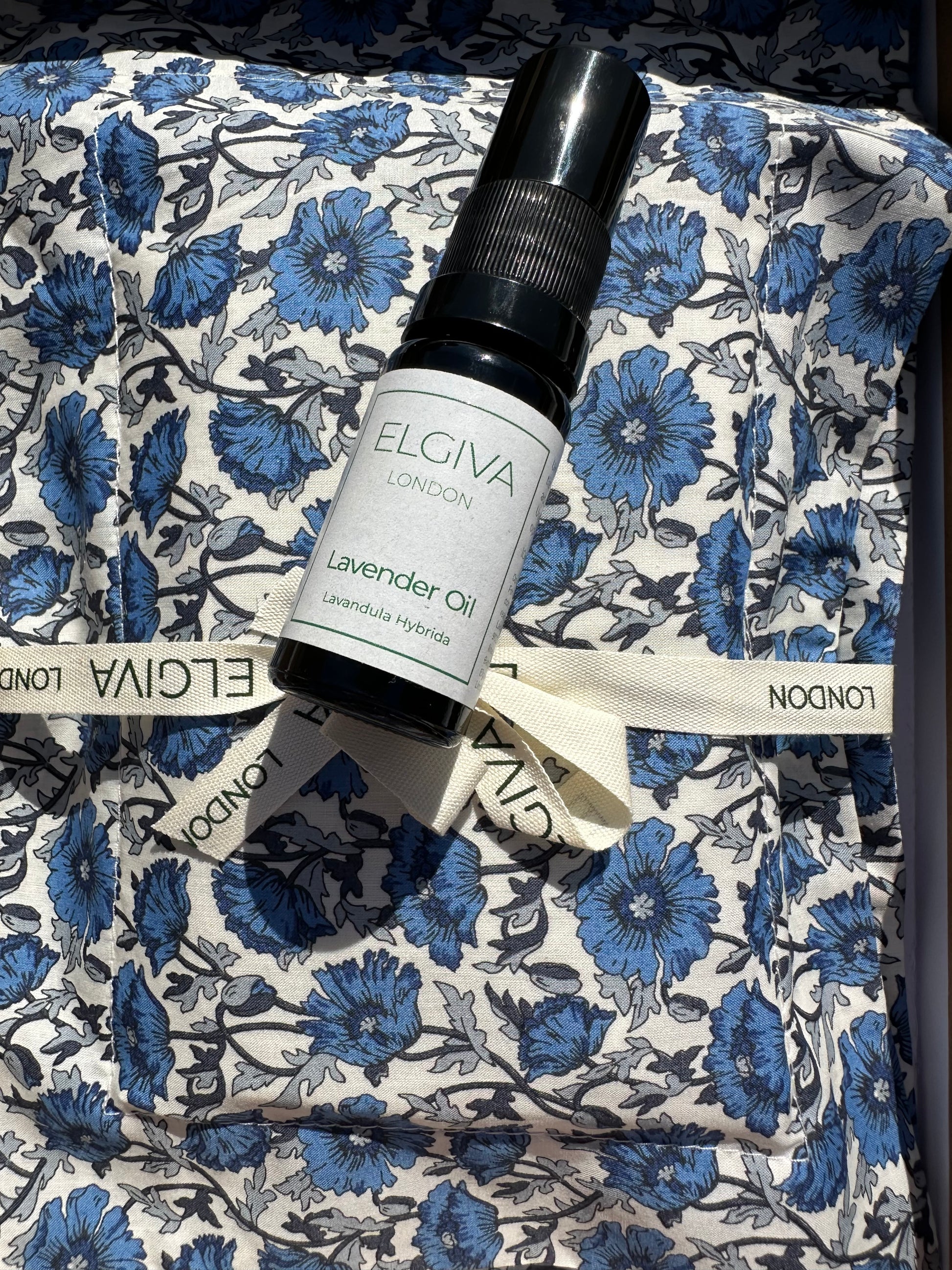 Elgiva London lavender oil bottle on an Elgiva London lavender sachet with ribbon in a box