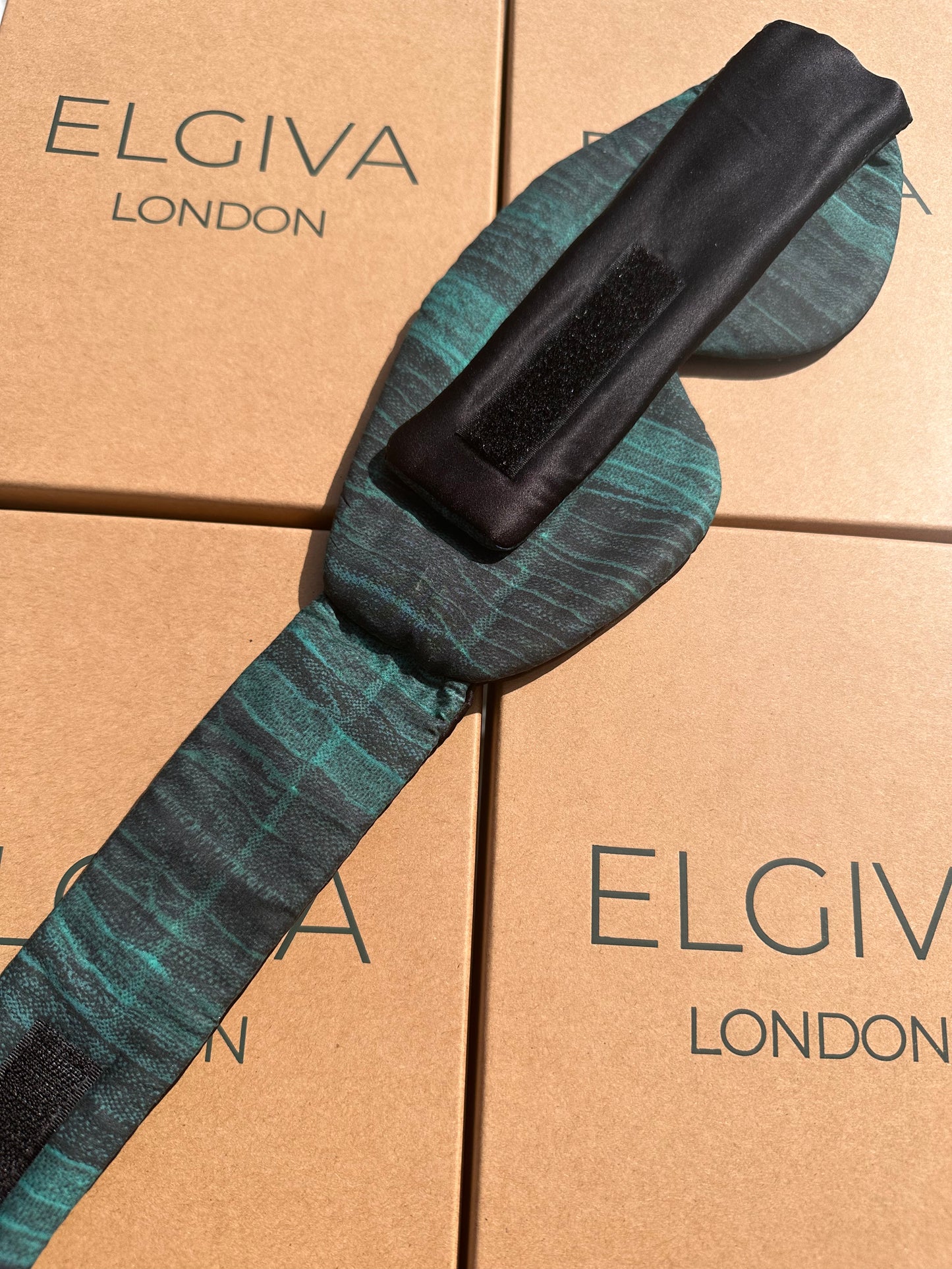 Reverse side of Blackout luxury Elgiva sleep mask showing silk inner and velcro fastening