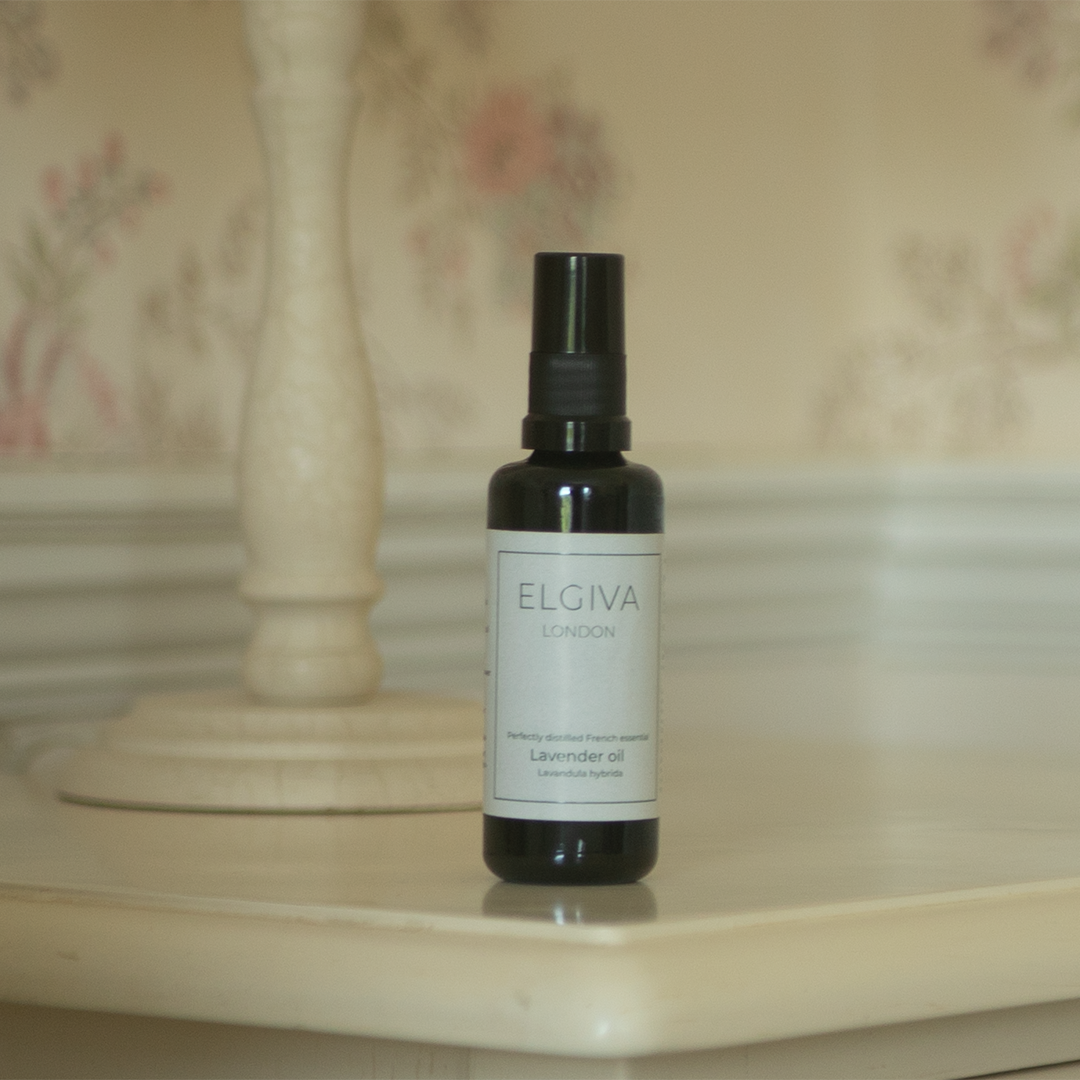 Elgiva London 50ml lavender oil bottle styled on a bedside table