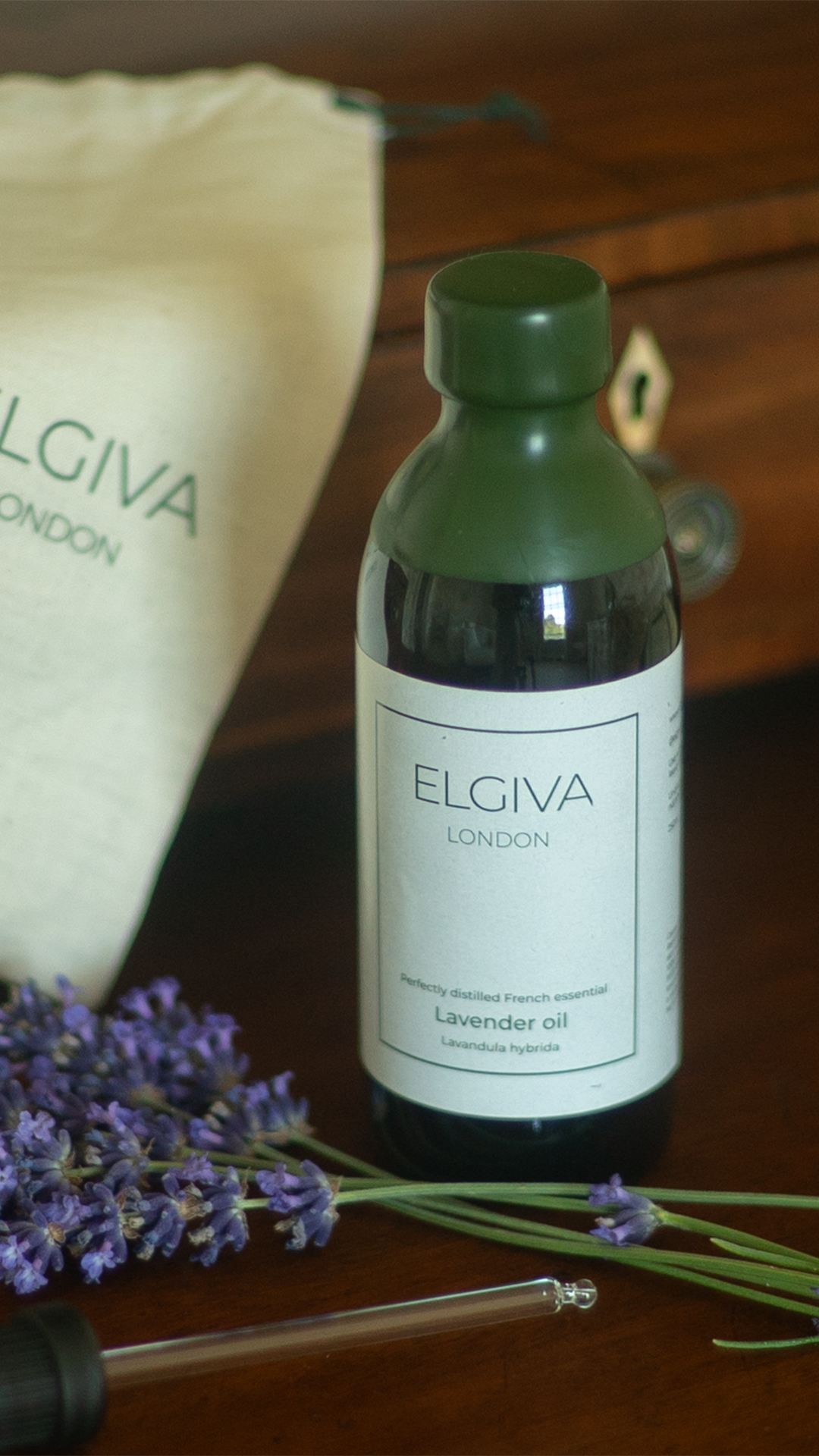 Elgiva London 250ml wax-topped lavender oil bottle, vertical styled shot